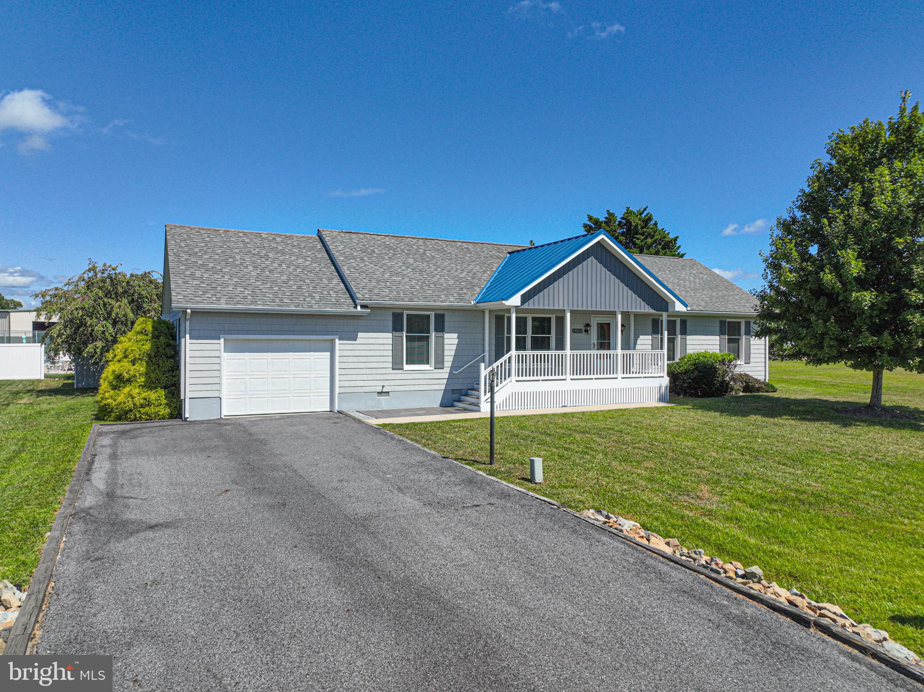 38241 Marlington Road Ocean View, DE 19970 - Photo 33 of 40 a house with swimming pool in front of it
