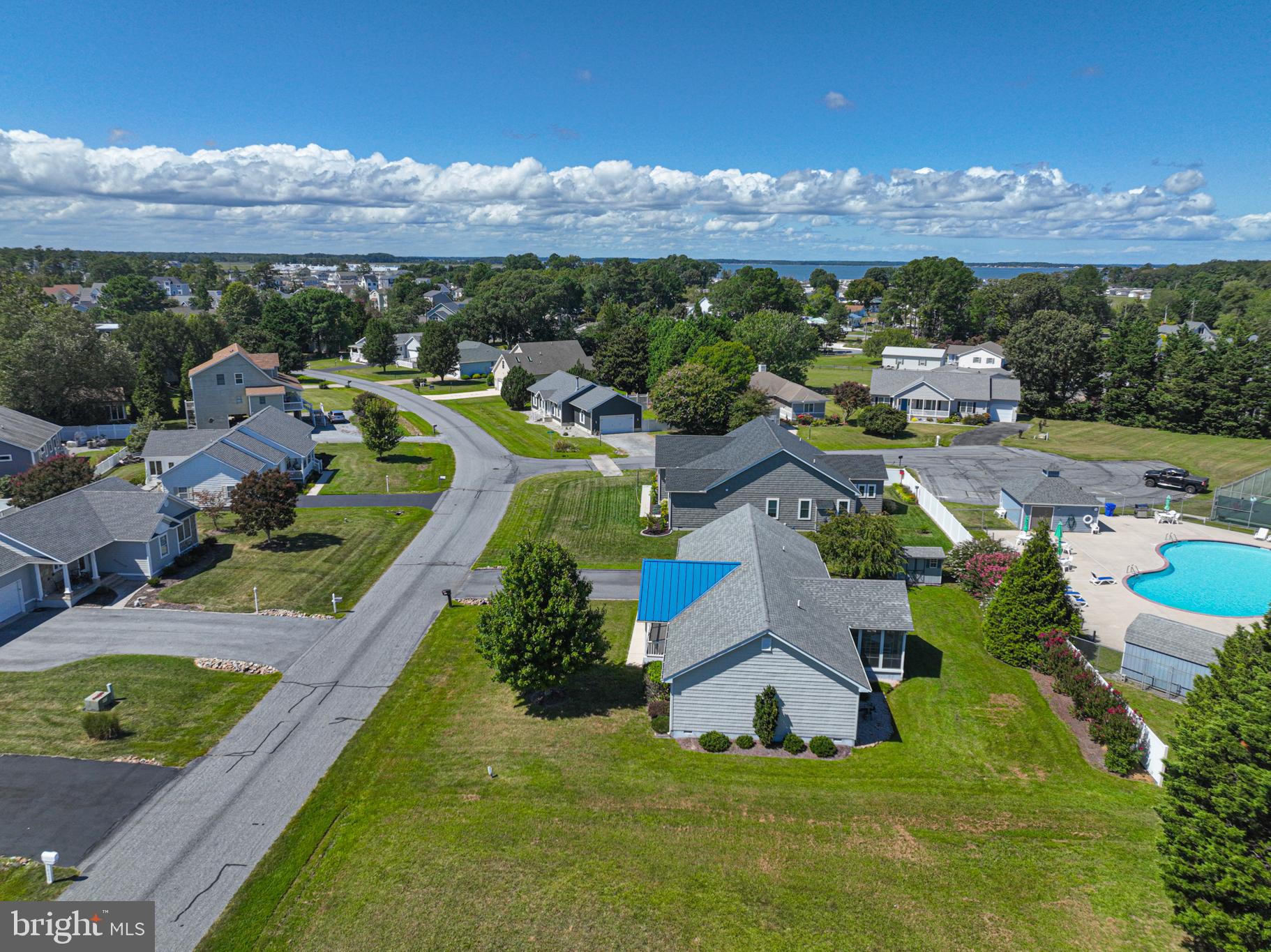 38241 Marlington Road Ocean View, DE 19970 - Photo 36 of 40 an aerial view of residential houses with outdoor space and swimming pool