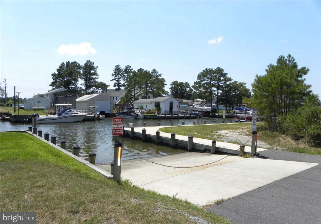 38241 Marlington Road Ocean View, DE 19970 - Photo 38 of 40 a view of swimming pool with a bench in patio