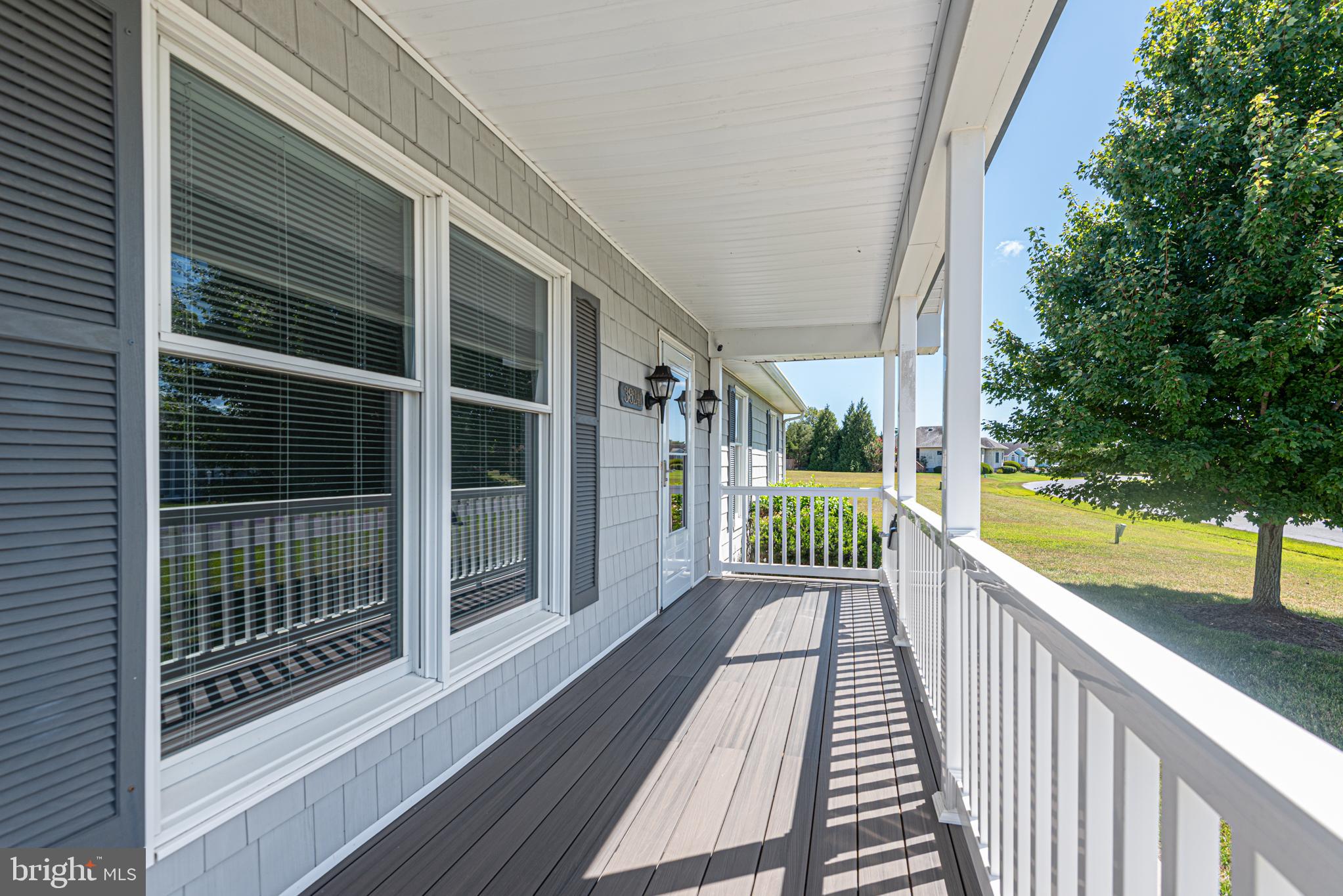 38241 Marlington Road Ocean View, DE 19970 - Photo 4 of 40 a view of balcony with wooden floor and fence