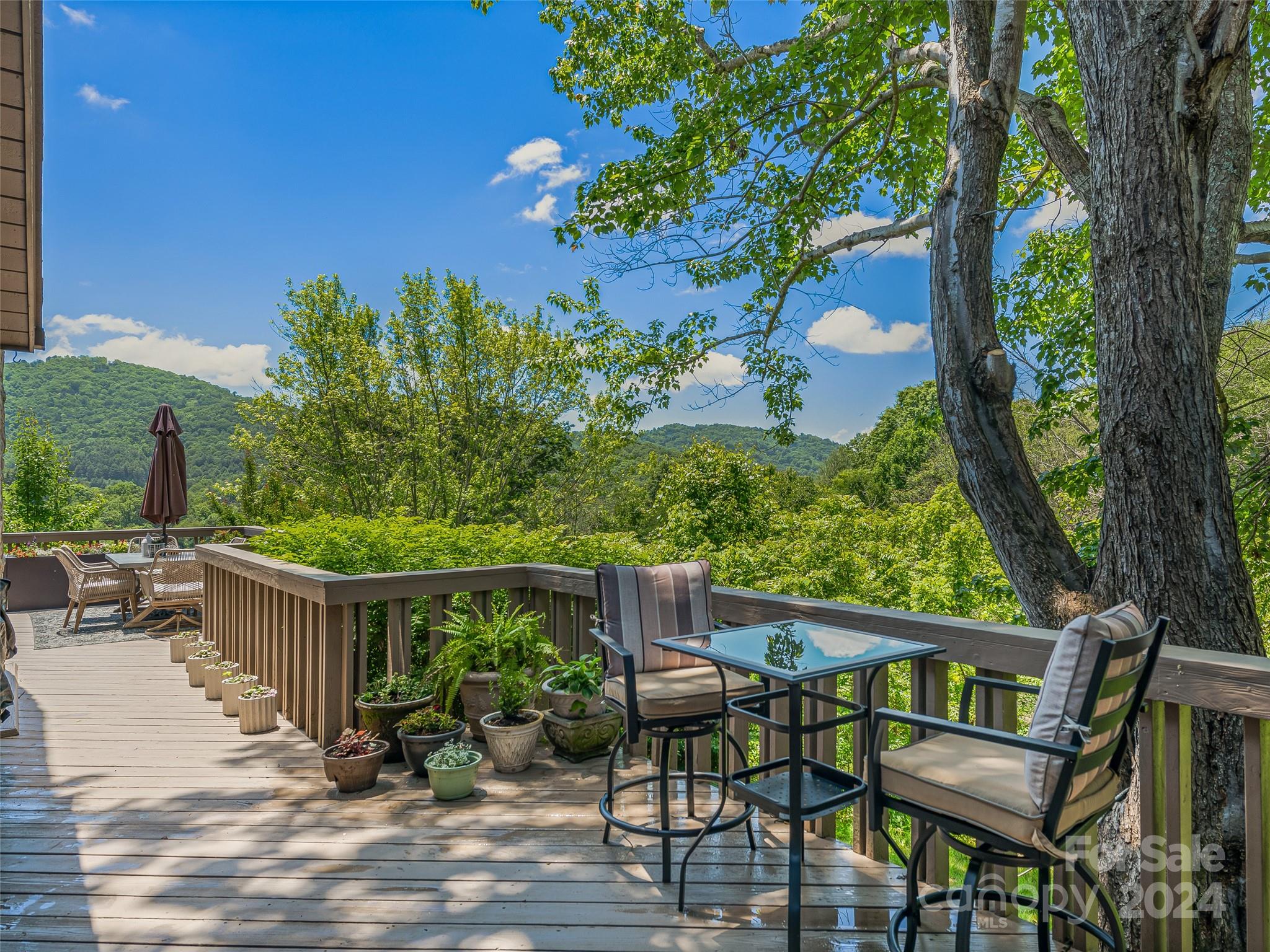 36 Stony Ridge Asheville, NC 28804 - Photo 13 of 38 a view of an chairs and table in the patio