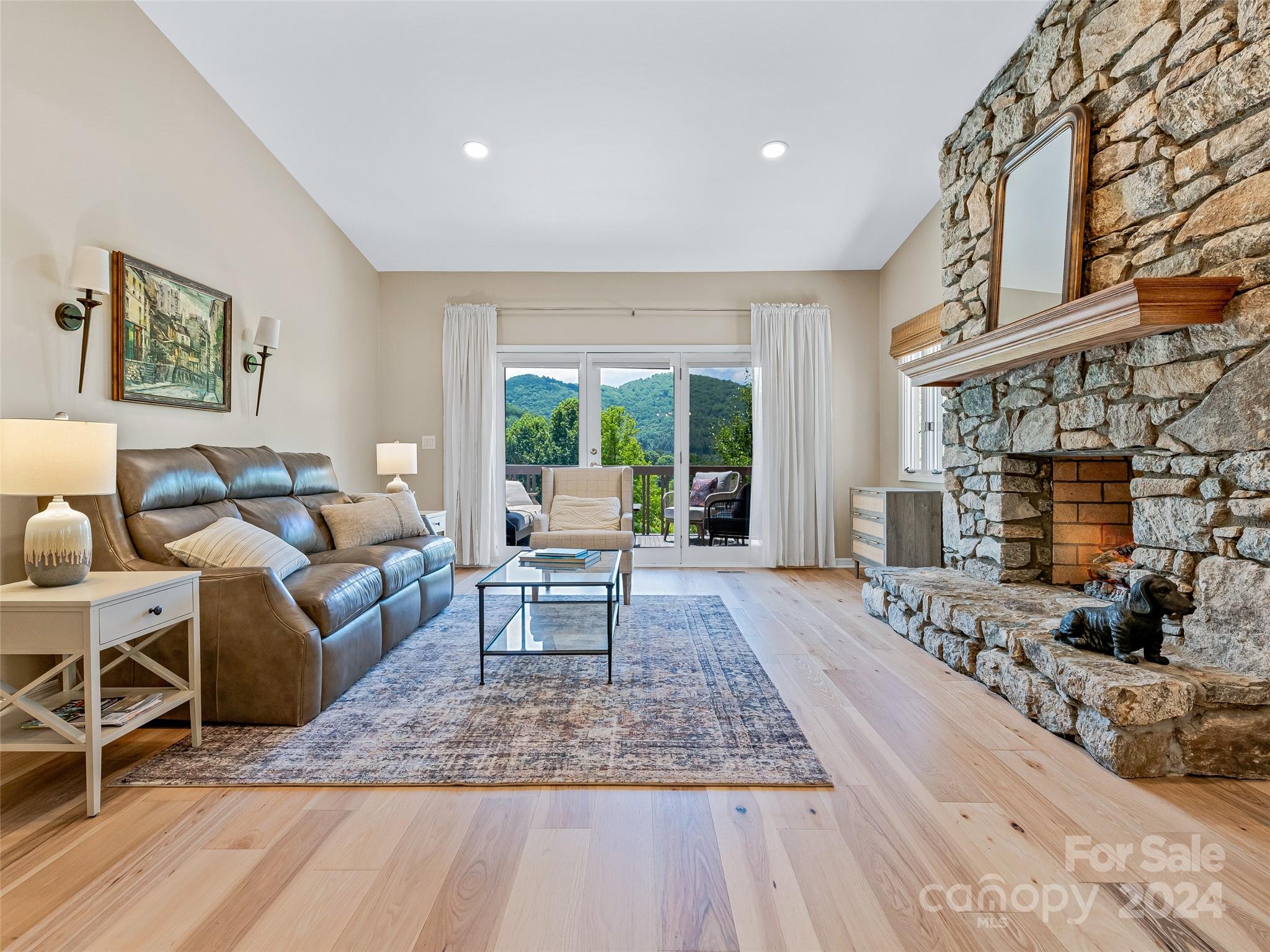 36 Stony Ridge Asheville, NC 28804 - Photo 17 of 38 a living room with furniture and a fireplace