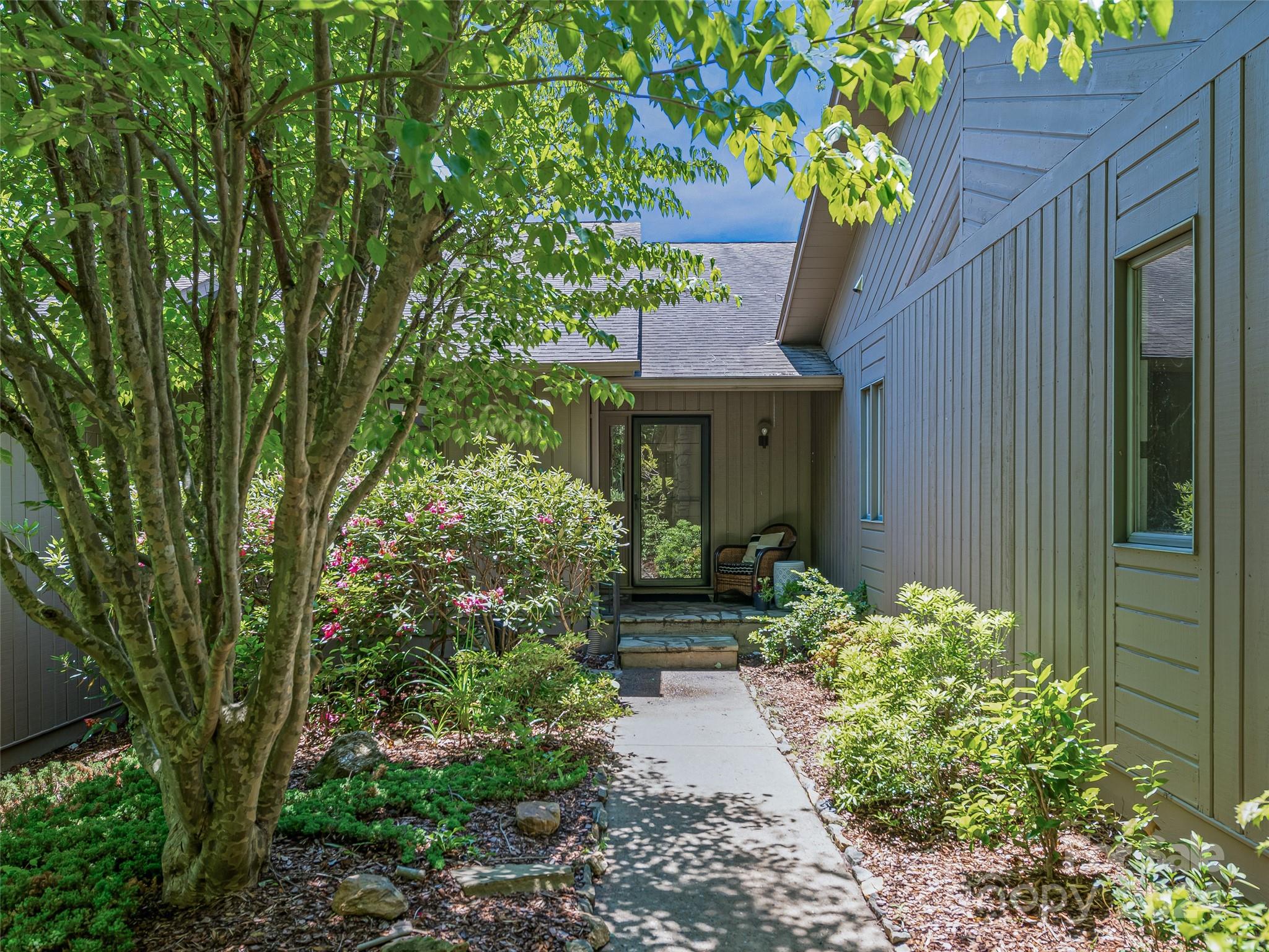 36 Stony Ridge Asheville, NC 28804 - Photo 2 of 38 a front view of a house with a yard