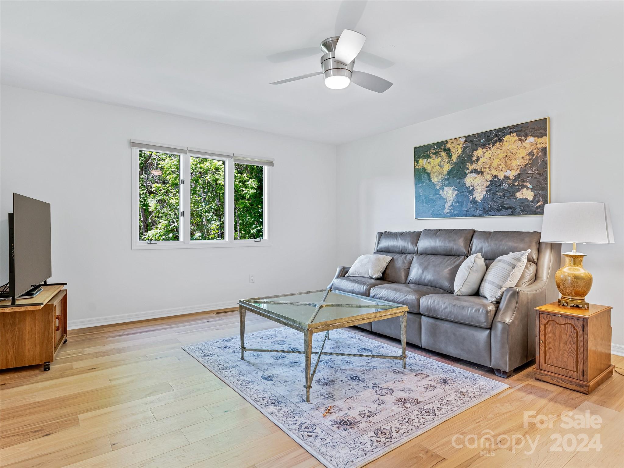 36 Stony Ridge Asheville, NC 28804 - Photo 28 of 38 a living room with furniture and a flat screen tv