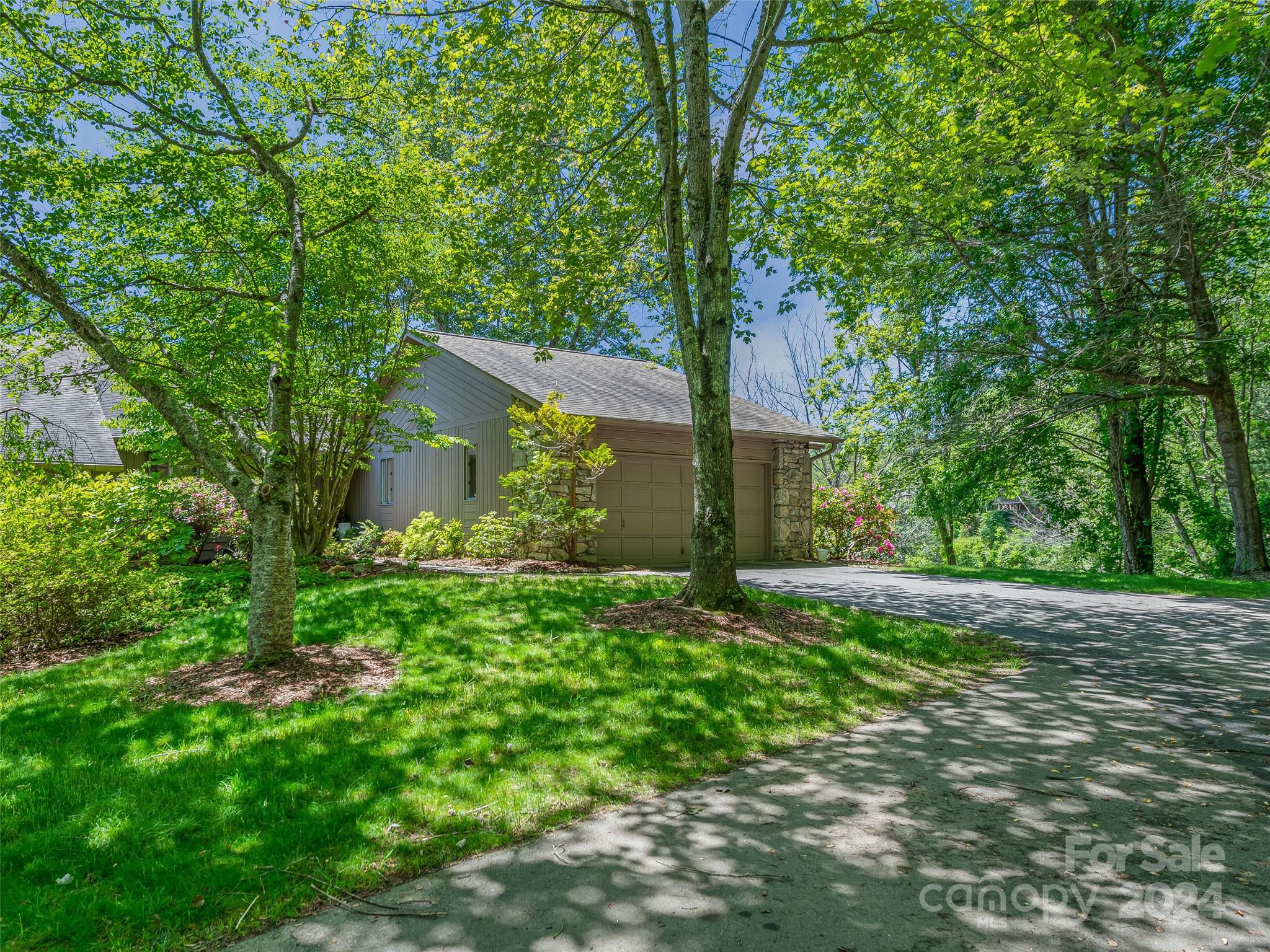 36 Stony Ridge Asheville, NC 28804 - Photo 4 of 38 a view of a house with a tree in a yard