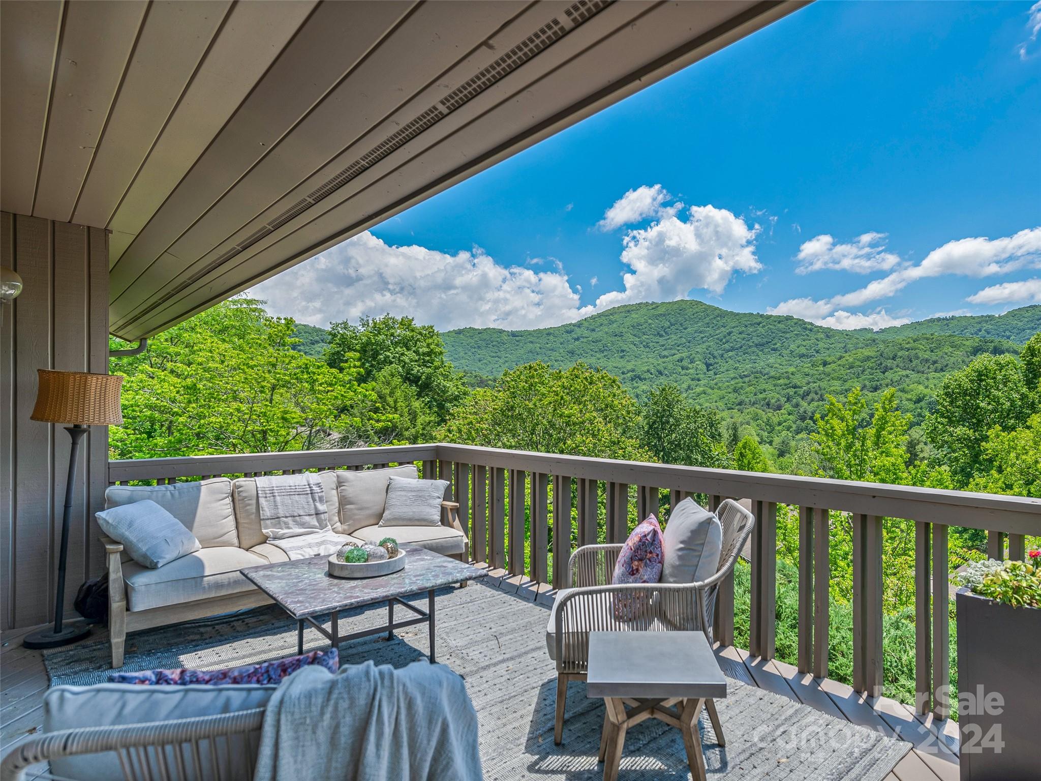 36 Stony Ridge Asheville, NC 28804 - Photo 10 of 38 a view of a chairs and table in the balcony