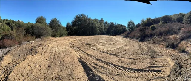 a view of a park with swings