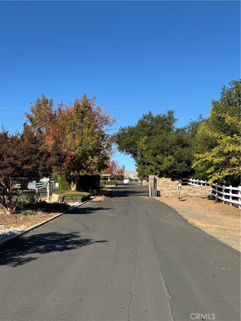 0 Arroyo Road Lake Elsinore, CA 92530 - Photo 3 of 59 a view of a street with a building in the background