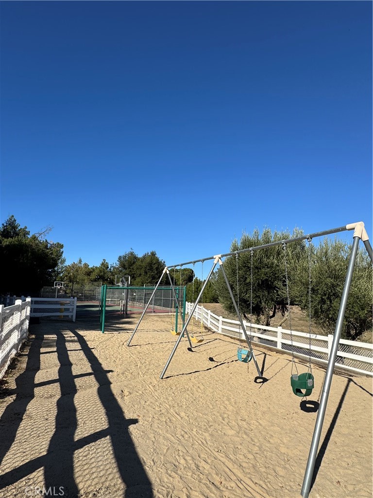 0 Arroyo Road Lake Elsinore, CA 92530 - Photo 34 of 59 a view of swimming pool with a lounge chair
