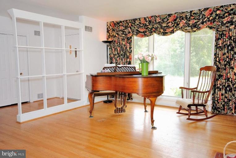 3112 Sleepy Hollow Road Falls Church, VA 22042 - Photo 5 of 20 a living room with furniture and a floor to ceiling window