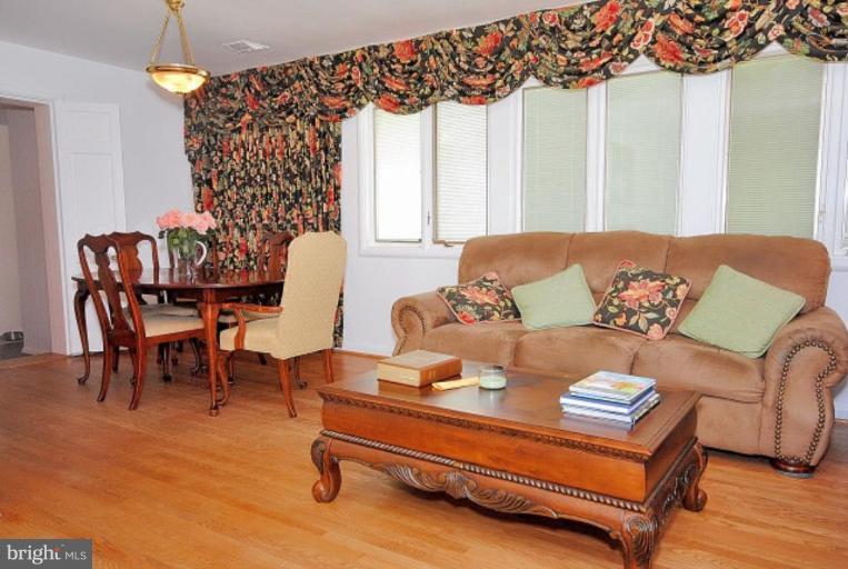 3112 Sleepy Hollow Road Falls Church, VA 22042 - Photo 8 of 20 a living room with furniture and a potted plant