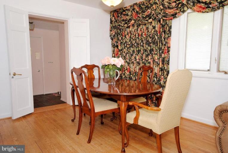 3112 Sleepy Hollow Road Falls Church, VA 22042 - Photo 9 of 20 a view of a dining room with furniture and wooden floor
