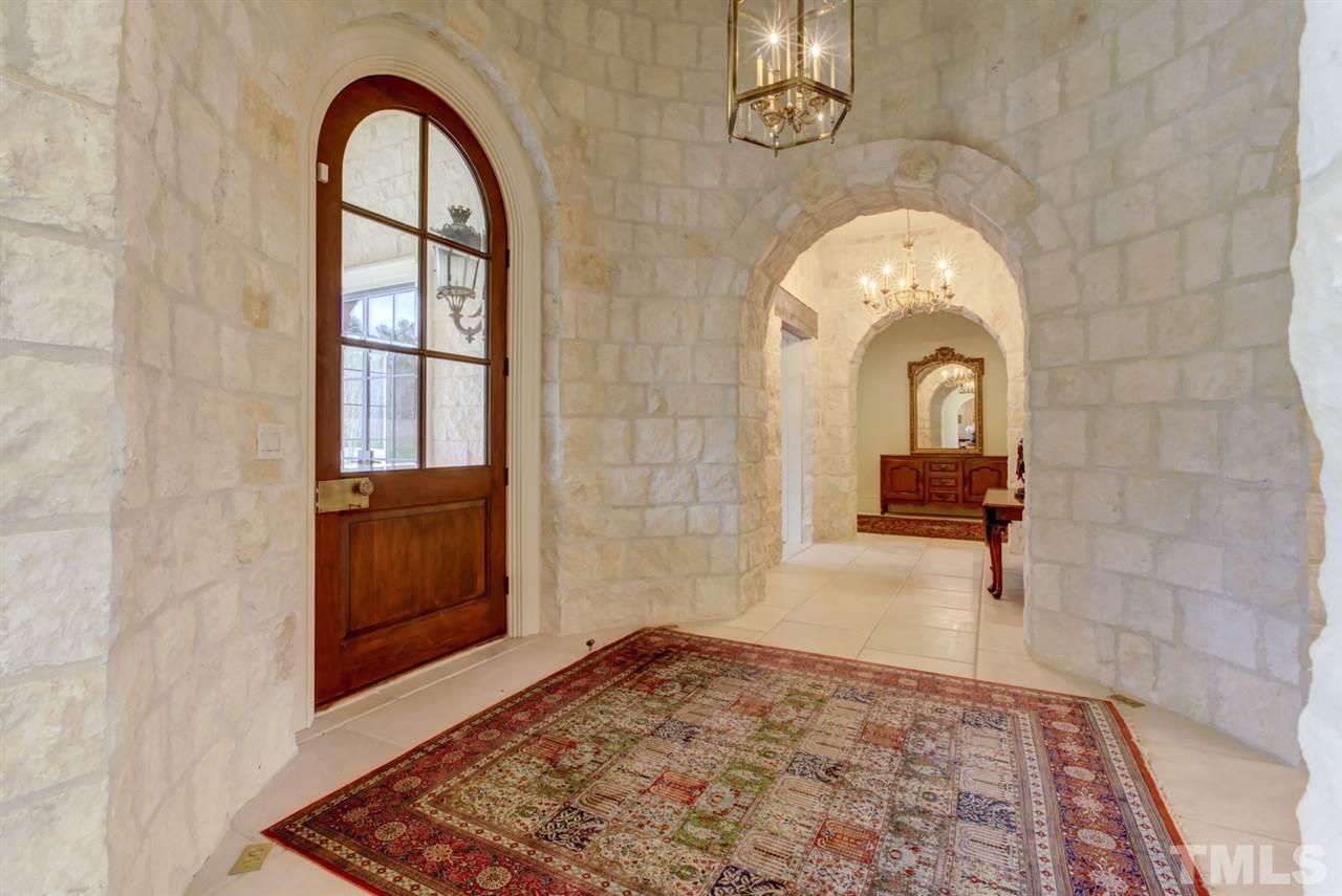648 Tant Road Spring Hope, NC 27882 - Photo 3 of 30 This beautiful house was constructed with cut limestone block walls with arched entryways and tumbled limestone flooring.