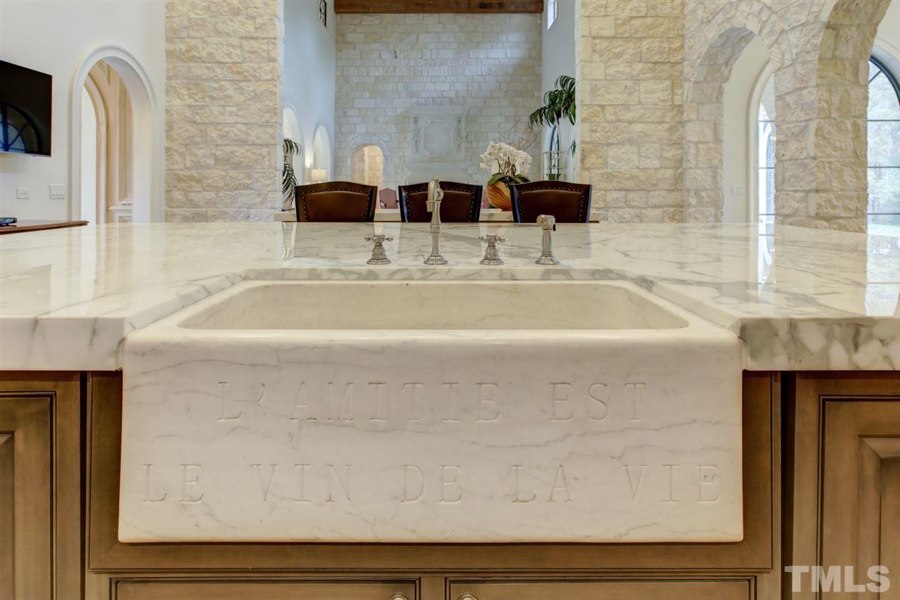 648 Tant Road Spring Hope, NC 27882 - Photo 7 of 30 Handmade farmhouse marble sink engraved with “L'Amitie Est Le Vin De La Vie” which translates to “Friendship is the Wine of Life”