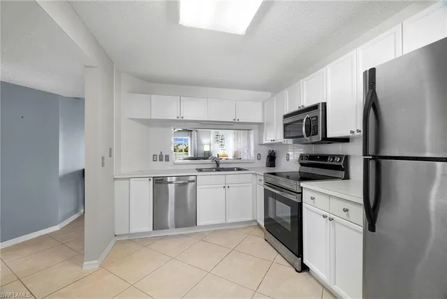 $319,999 | 7706 Jewel Lane, Unit 101, Naples, FL 34109