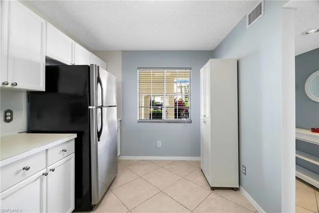 $319,999 | 7706 Jewel Lane, Unit 101, Naples, FL 34109
