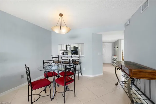 $319,999 | 7706 Jewel Lane, Unit 101, Naples, FL 34109
