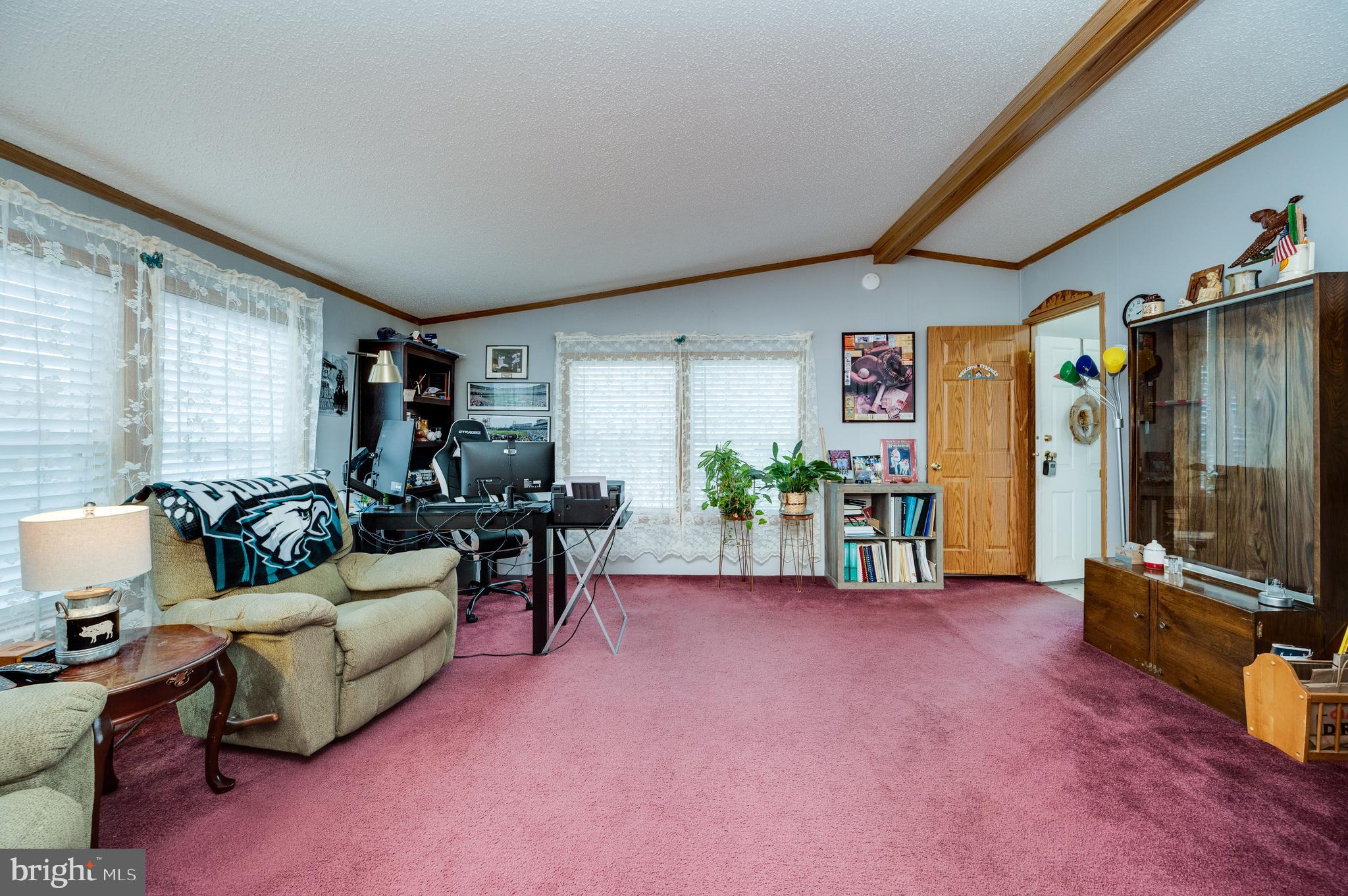 400 Allenbrook Lane Reading, PA 19606 - Photo 11 of 27 a living room with furniture and a flat screen tv