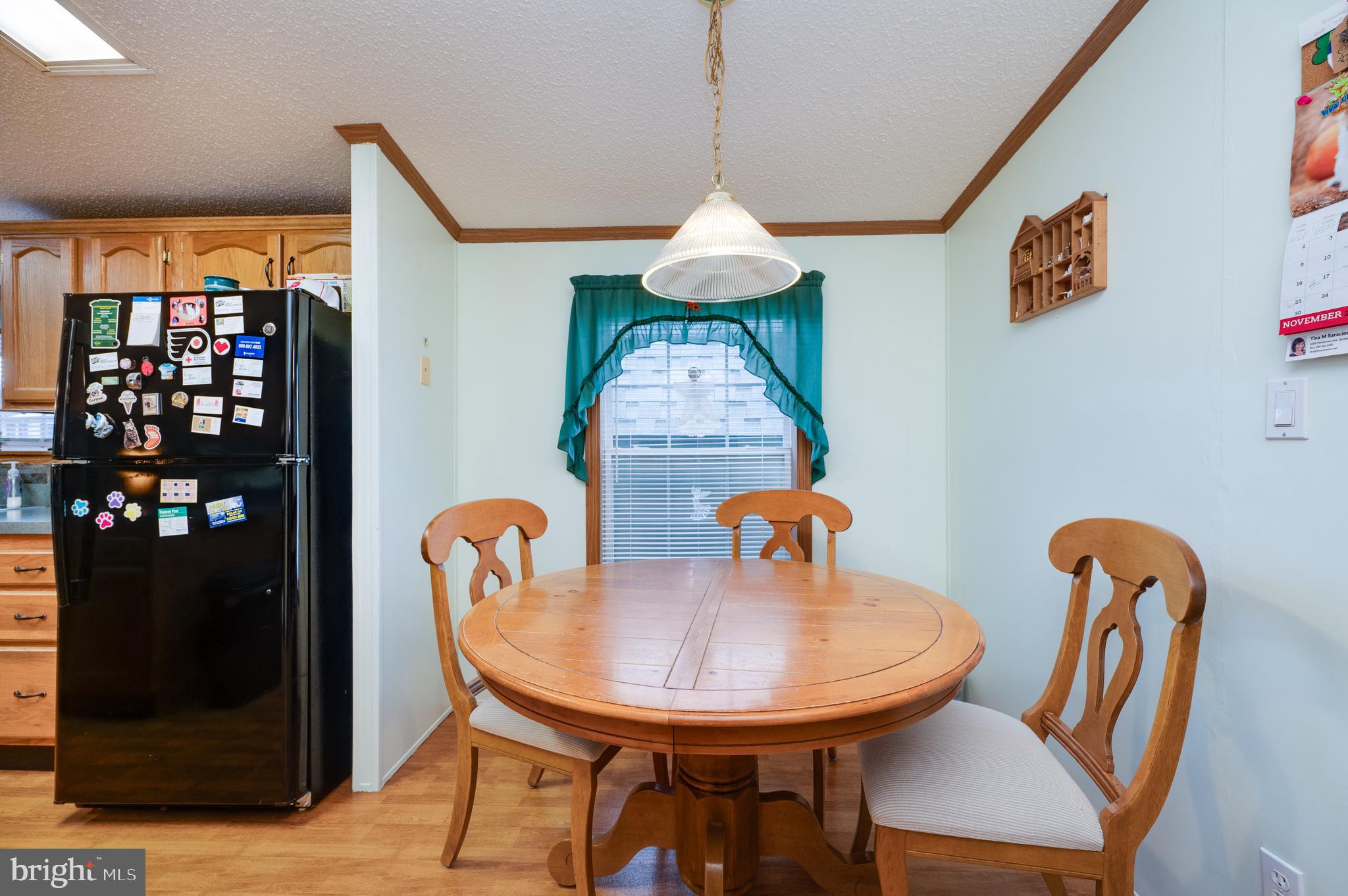 400 Allenbrook Lane Reading, PA 19606 - Photo 13 of 27 a dining room with furniture and wooden floor