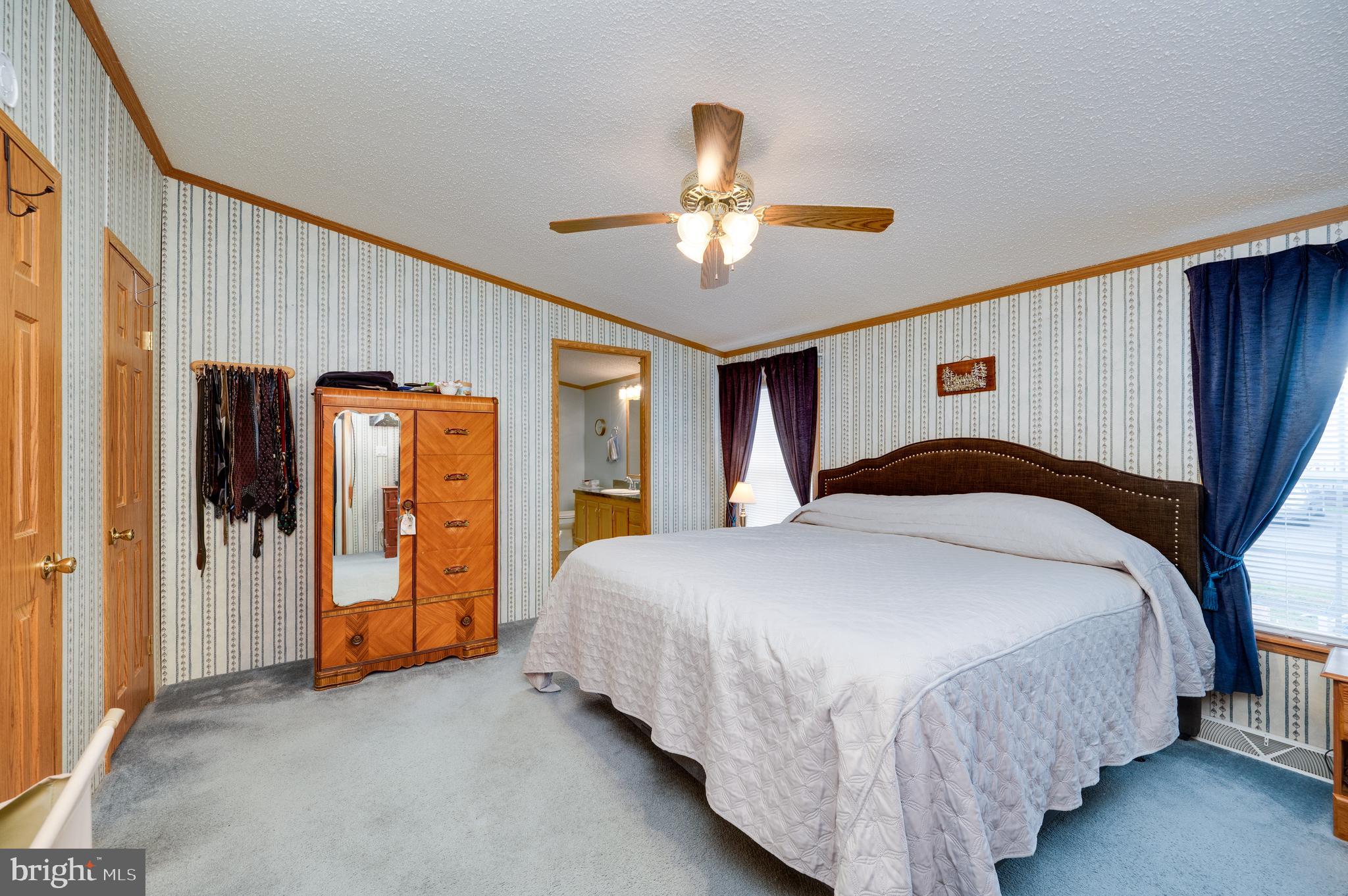 400 Allenbrook Lane Reading, PA 19606 - Photo 19 of 27 a bedroom with bed and window