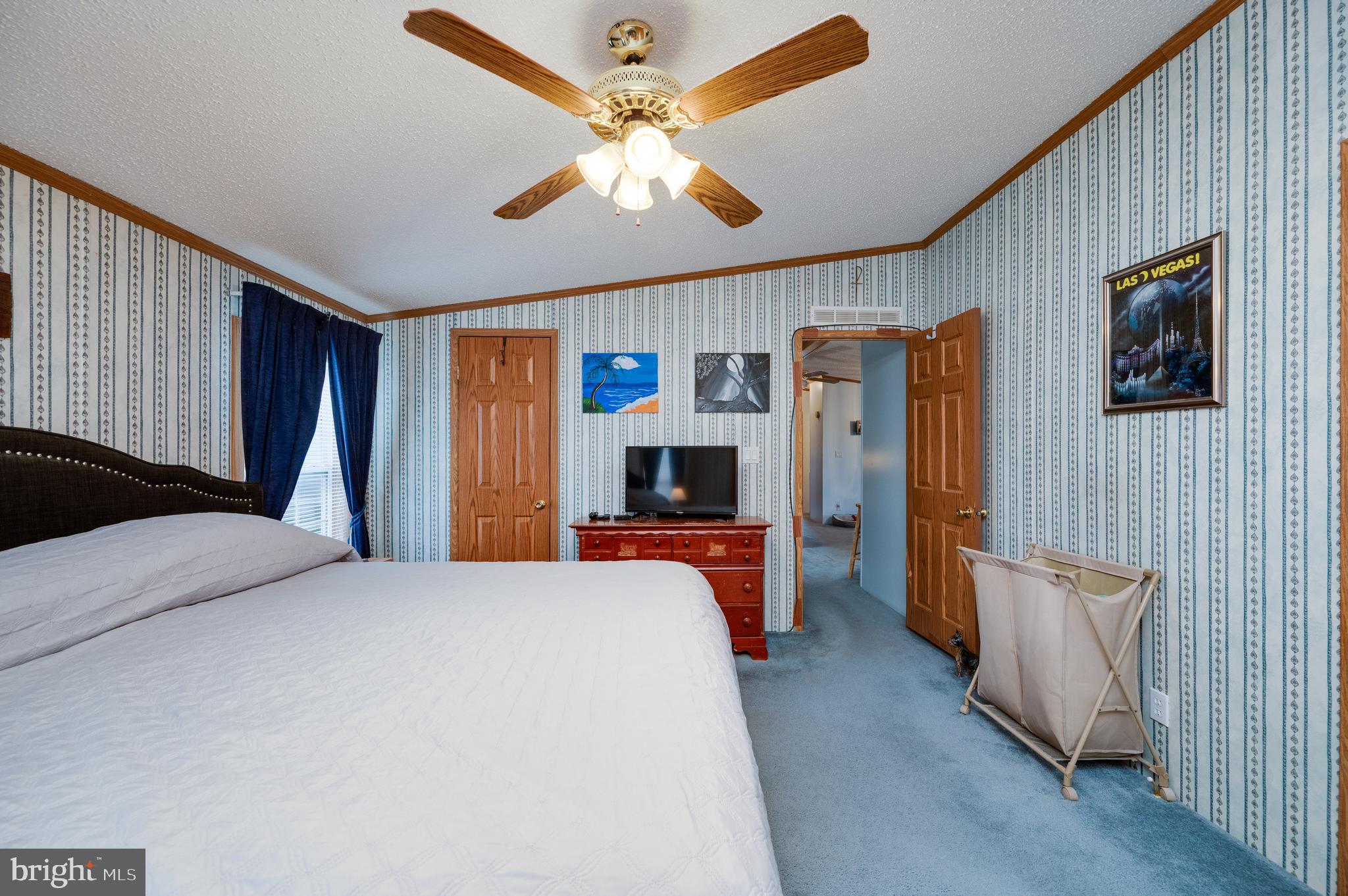 400 Allenbrook Lane Reading, PA 19606 - Photo 20 of 27 a bedroom with a bed and a flat screen tv