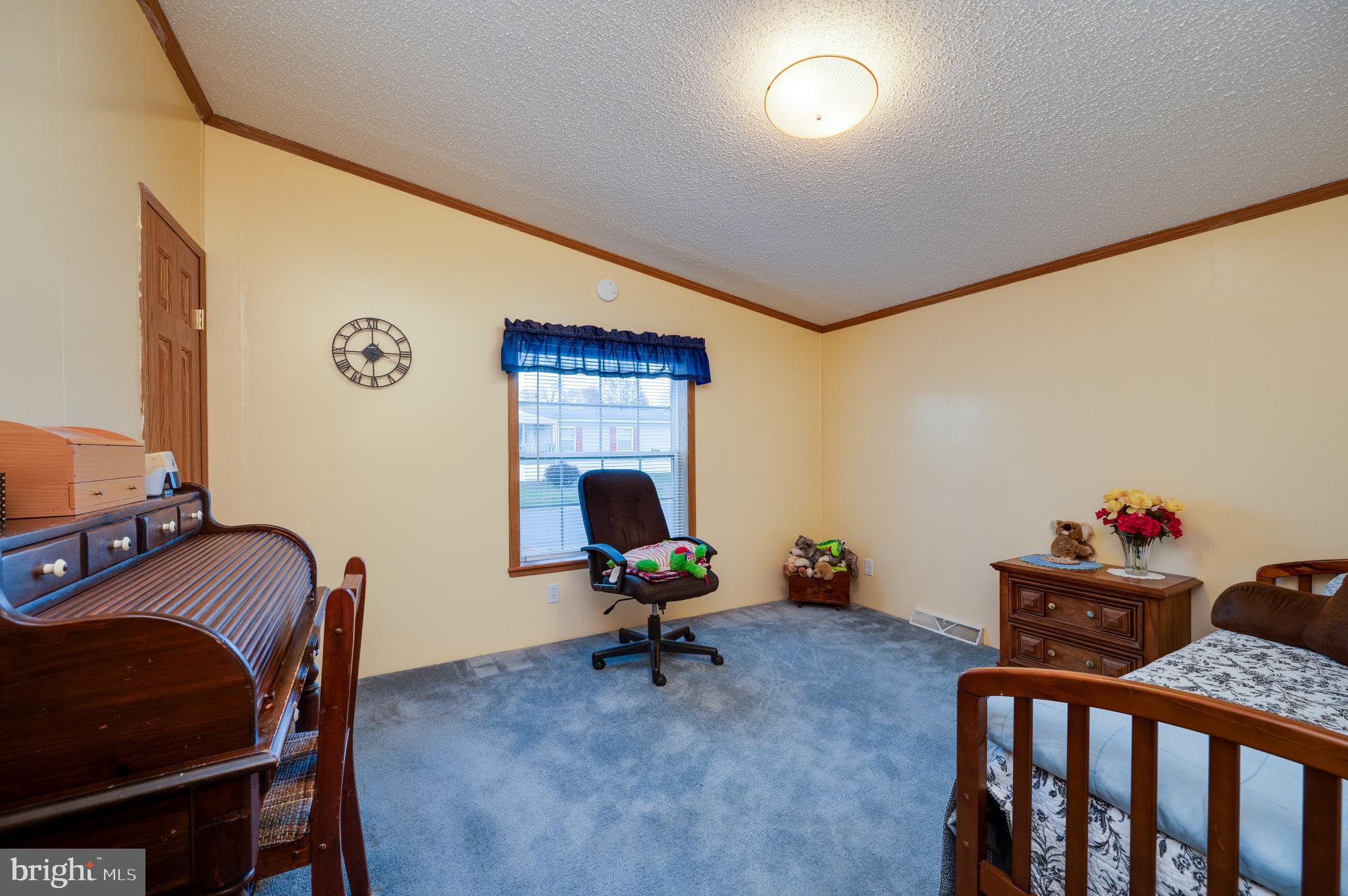 400 Allenbrook Lane Reading, PA 19606 - Photo 26 of 27 a living room with furniture and a window