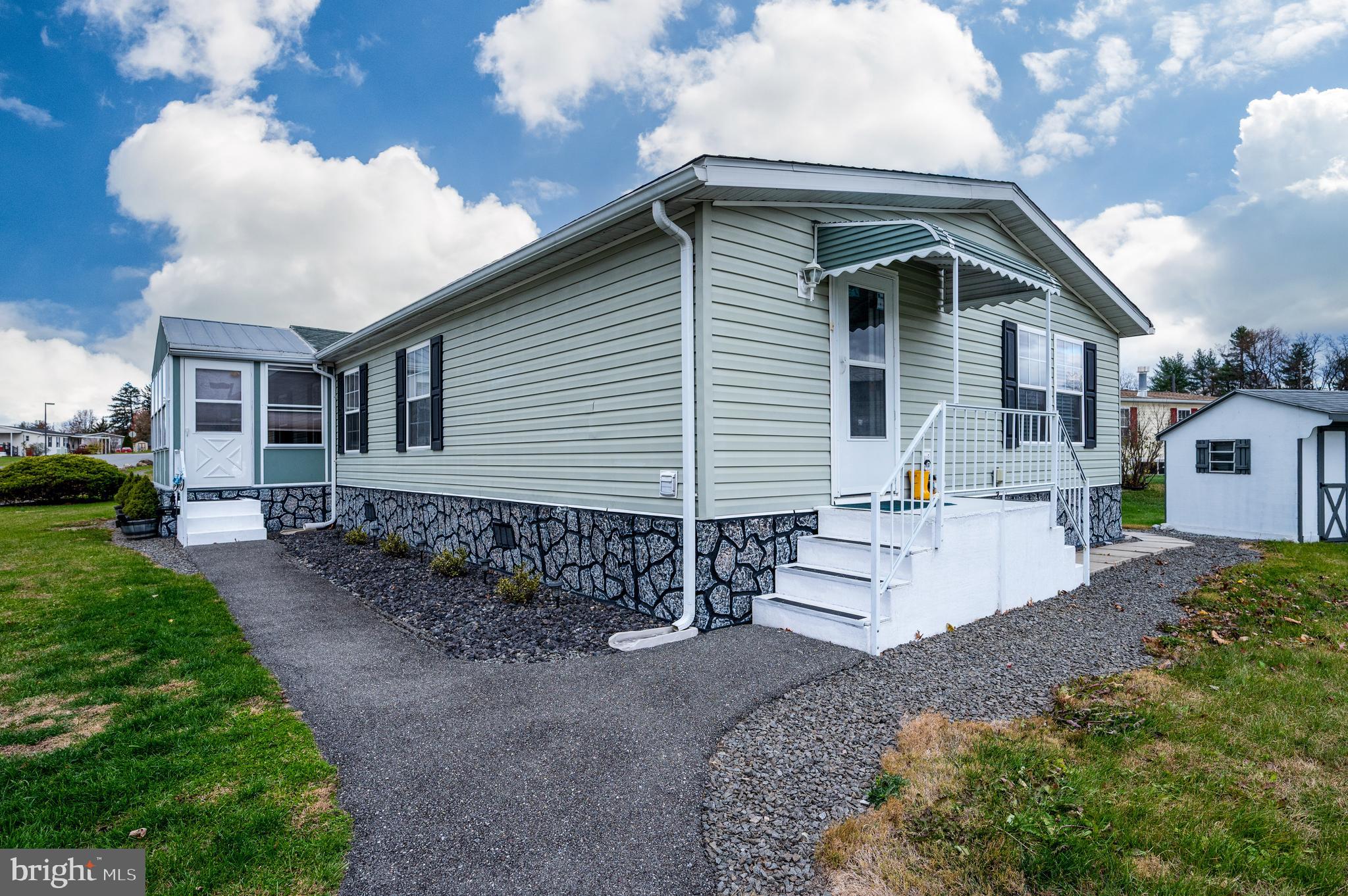 400 Allenbrook Lane Reading, PA 19606 - Photo 3 of 27 a front view of a house with a yard