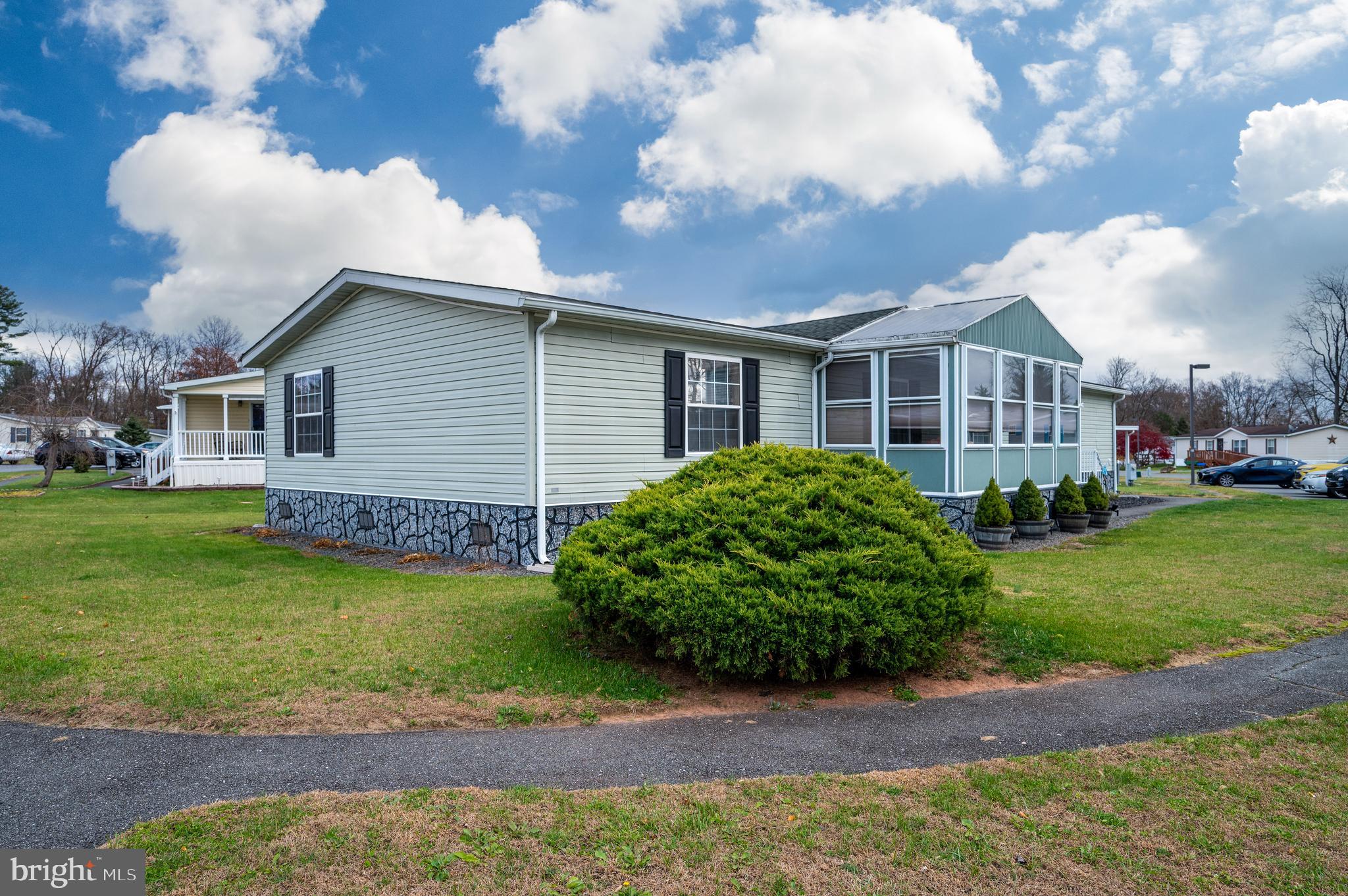 400 Allenbrook Lane Reading, PA 19606 - Photo 6 of 27 a view of a house with a garden