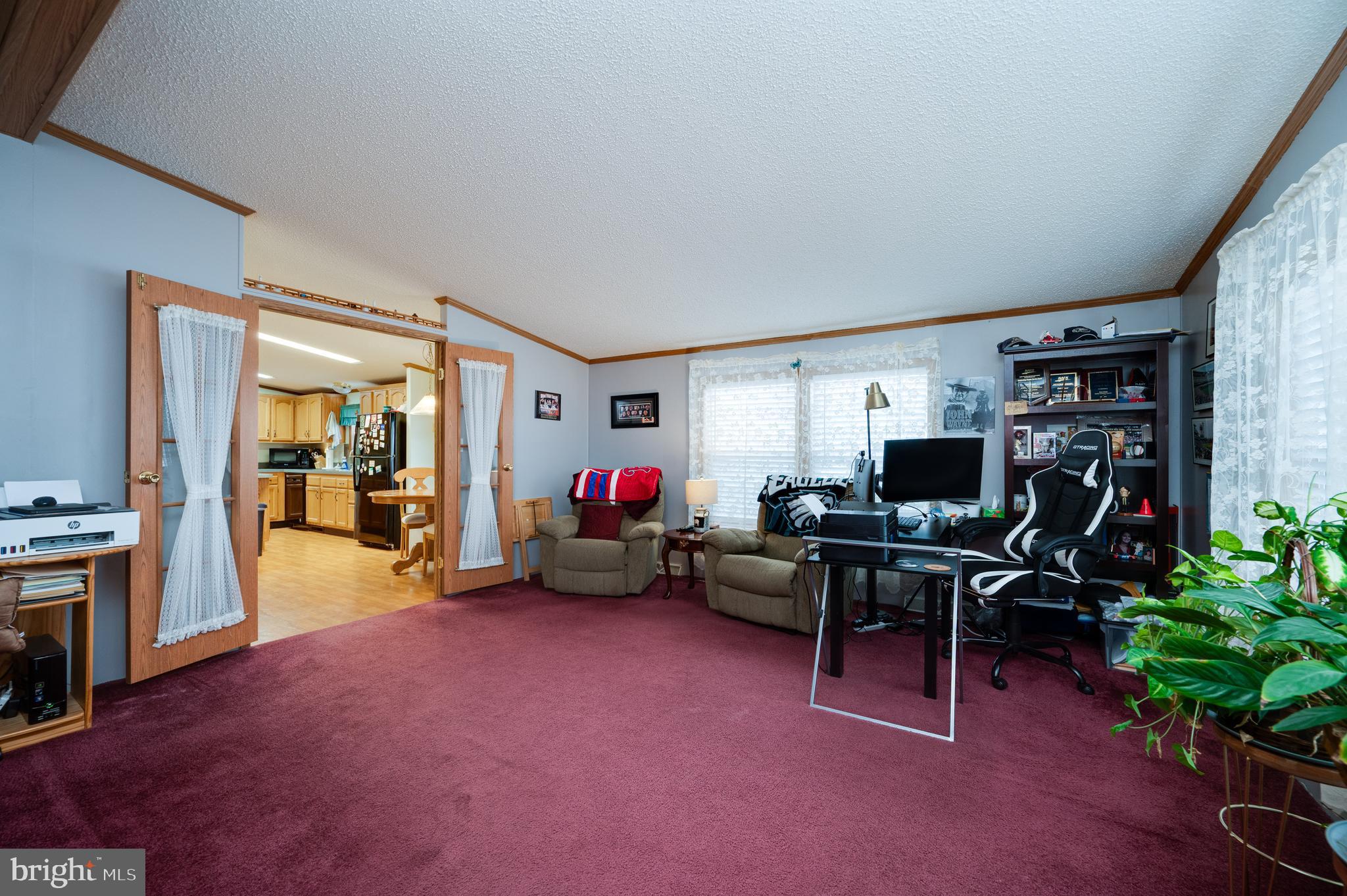400 Allenbrook Lane Reading, PA 19606 - Photo 10 of 27 a view of a livingroom with workspace and a window