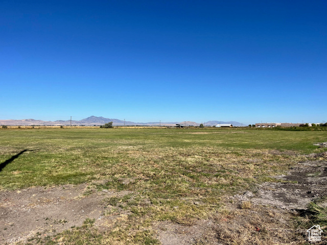 1200 West 1400 North Logan, UT 84321 - Photo 7 of 7 View of grassy yard with a view of countryside and a mountain view