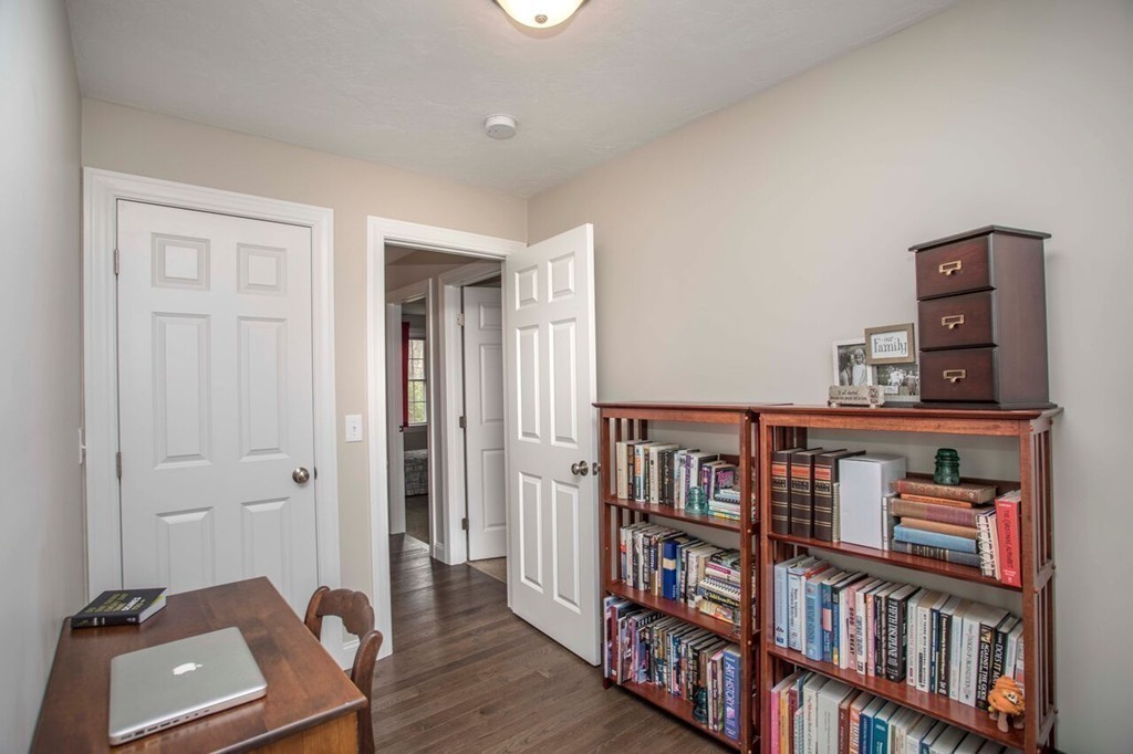 20 Strathmore Road East Bridgewater, MA 02333 - Photo 19 of 30 a view of a workspace with bookshelf