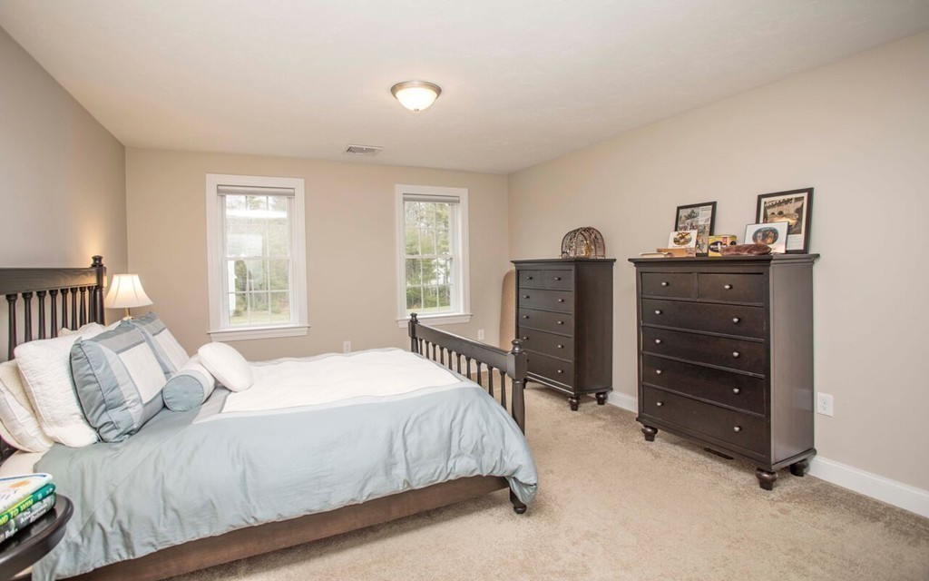 20 Strathmore Road East Bridgewater, MA 02333 - Photo 20 of 30 a bedroom with a bed and a closet