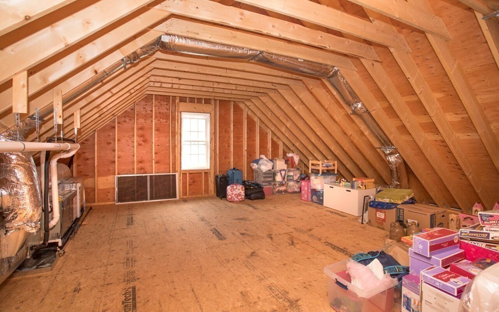 20 Strathmore Road East Bridgewater, MA 02333 - Photo 25 of 30 a view of a house with large space and a car parked