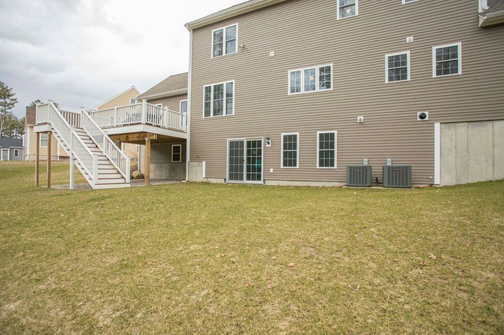20 Strathmore Road East Bridgewater, MA 02333 - Photo 28 of 30 a view of a house with many windows