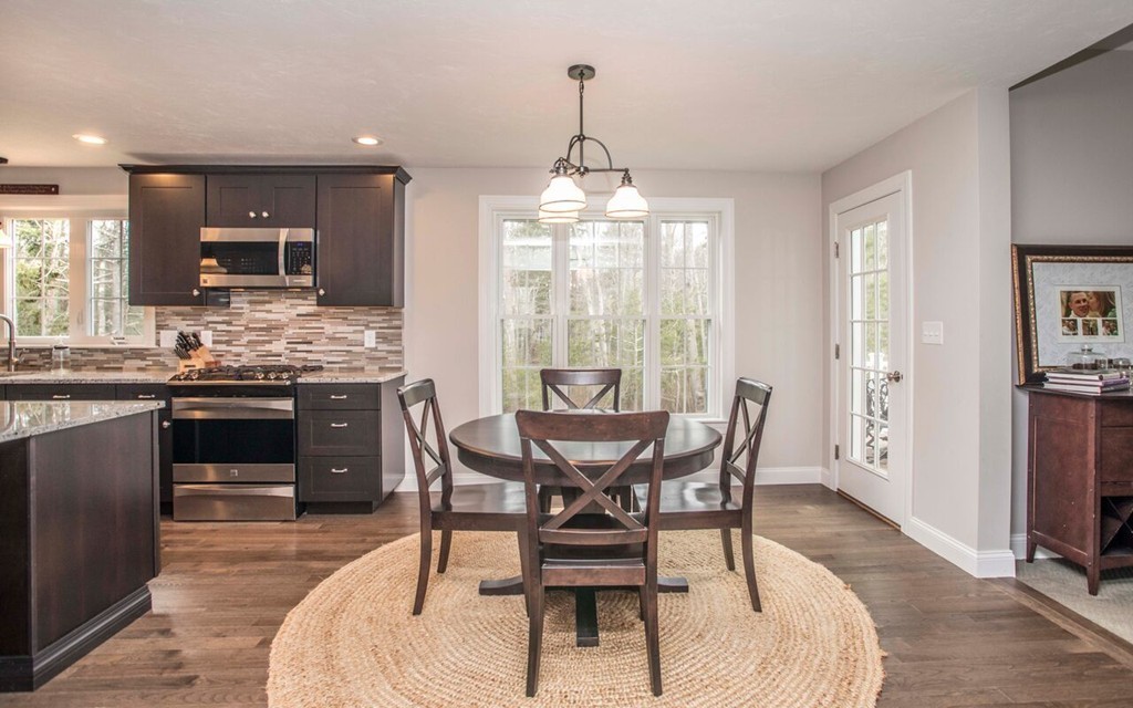 20 Strathmore Road East Bridgewater, MA 02333 - Photo 3 of 30 a dining room with a table chairs and kitchen view