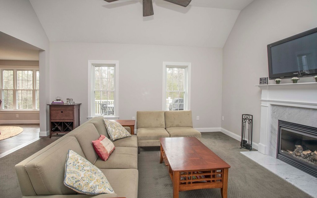 20 Strathmore Road East Bridgewater, MA 02333 - Photo 8 of 30 a living room with furniture and a fireplace