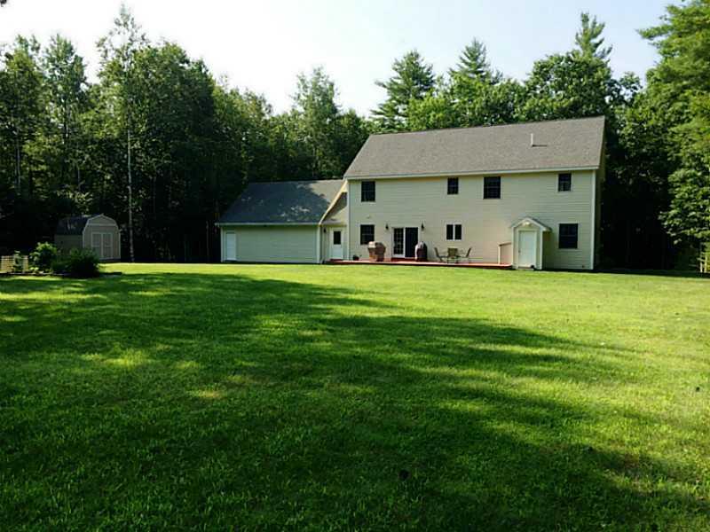 195 White Road Bowdoinham, ME 04008 - Photo 34 of 35 Exterior Back. Large garage and don...