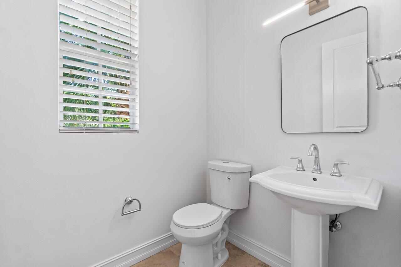 605 Renaissance Way Delray Beach, FL 33483 - Photo 13 of 36 powder room