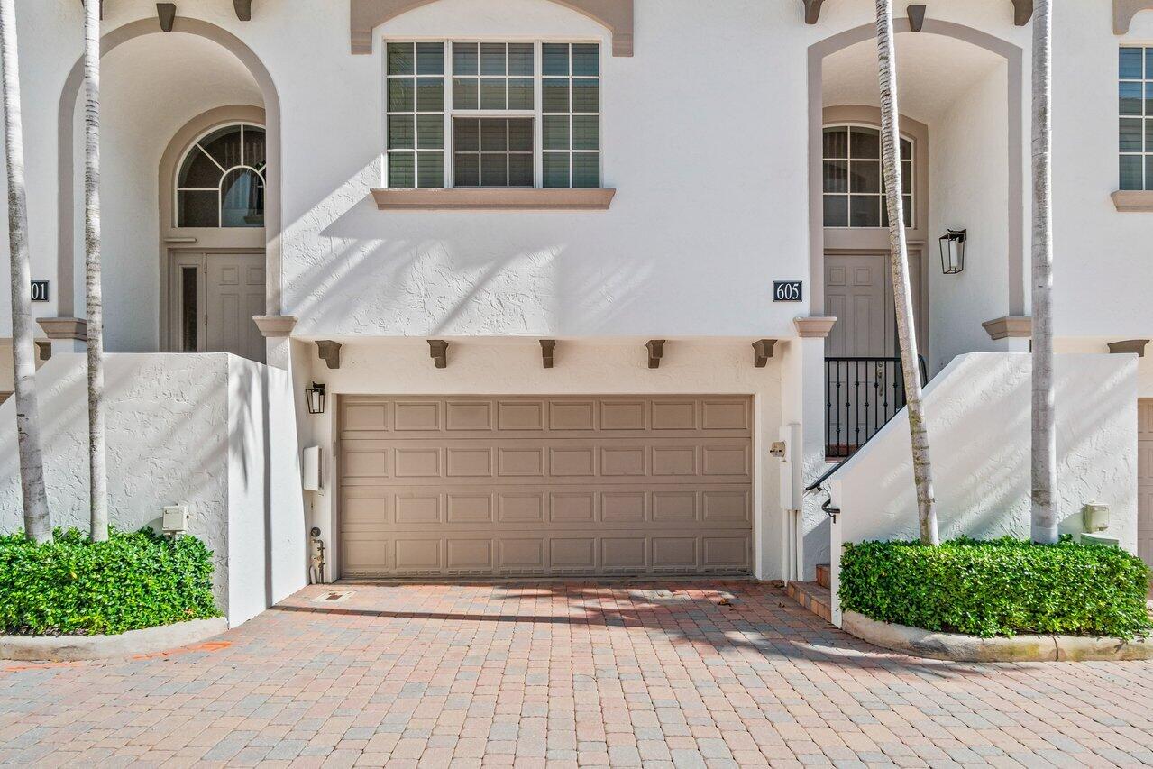 605 Renaissance Way Delray Beach, FL 33483 - Photo 2 of 36 front garage