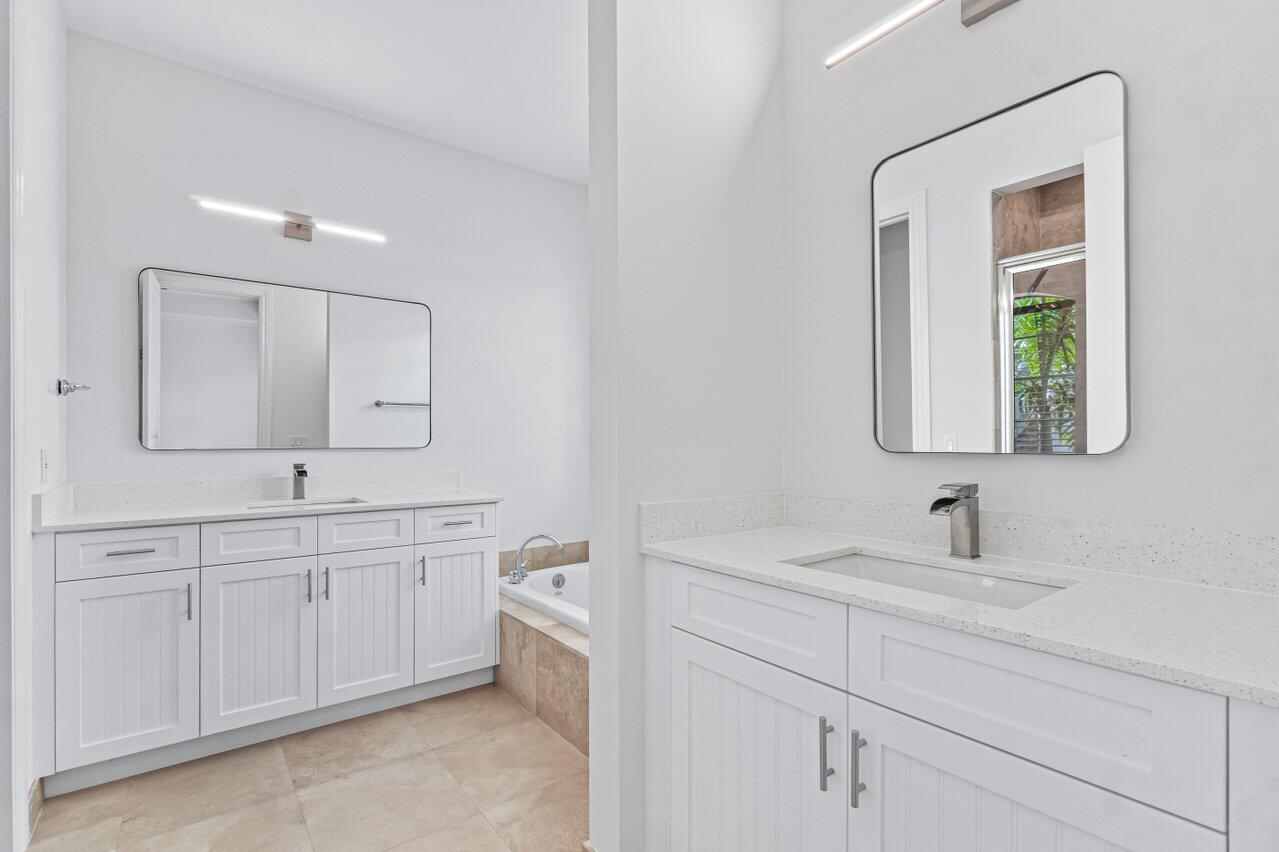 605 Renaissance Way Delray Beach, FL 33483 - Photo 22 of 36 primary bathroom