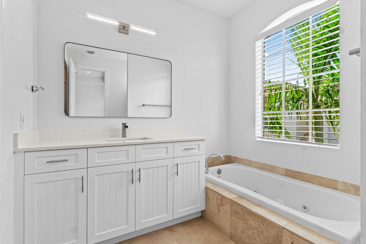 605 Renaissance Way Delray Beach, FL 33483 - Photo 23 of 36 primary bathroom