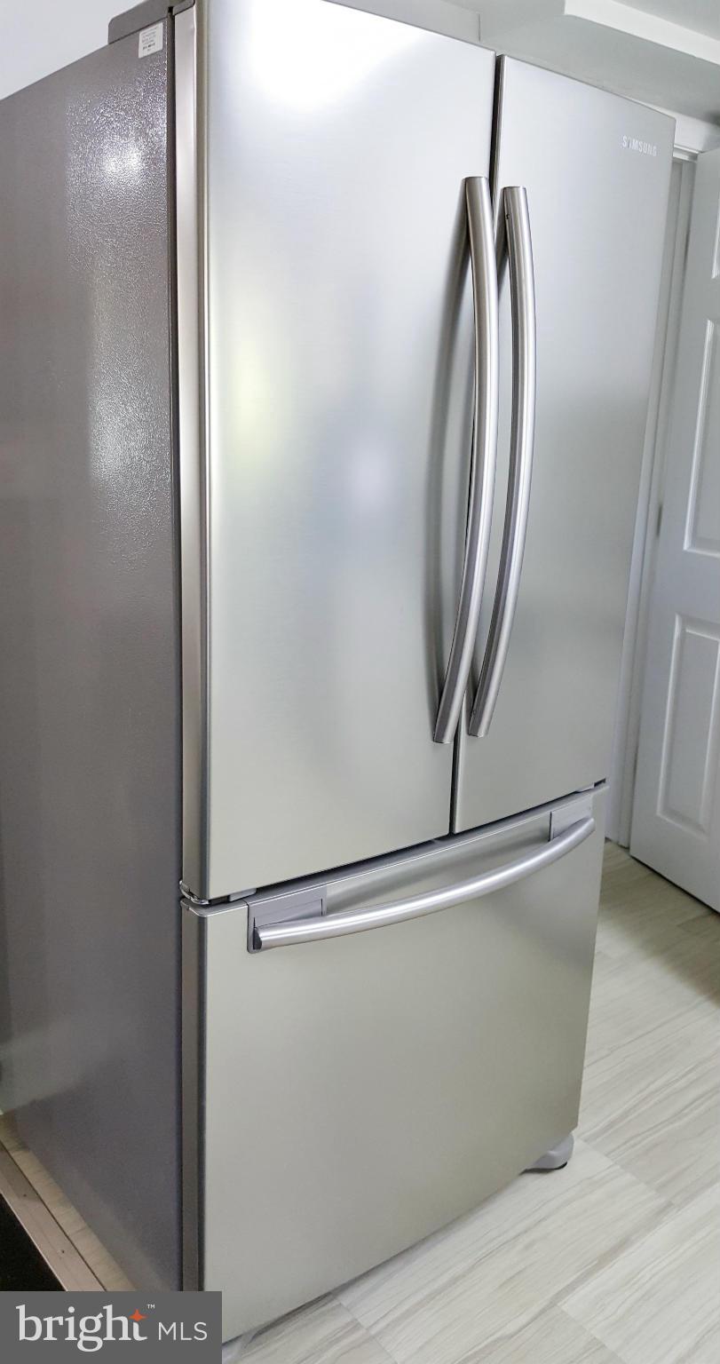8605 Oak Road Baltimore, MD 21234 - Photo 11 of 29 3-door stainless refrigerator/freezer