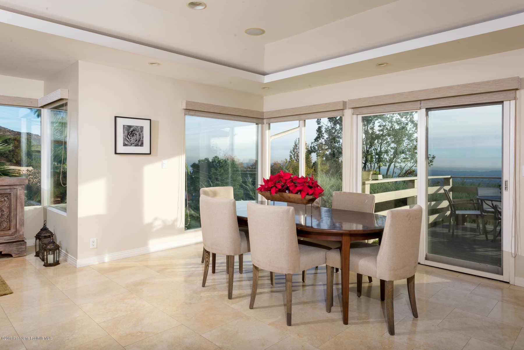 3430 Ellington Villa Drive Altadena, CA 91001 - Photo 16 of 49 a view of a dining room with furniture window and outside view