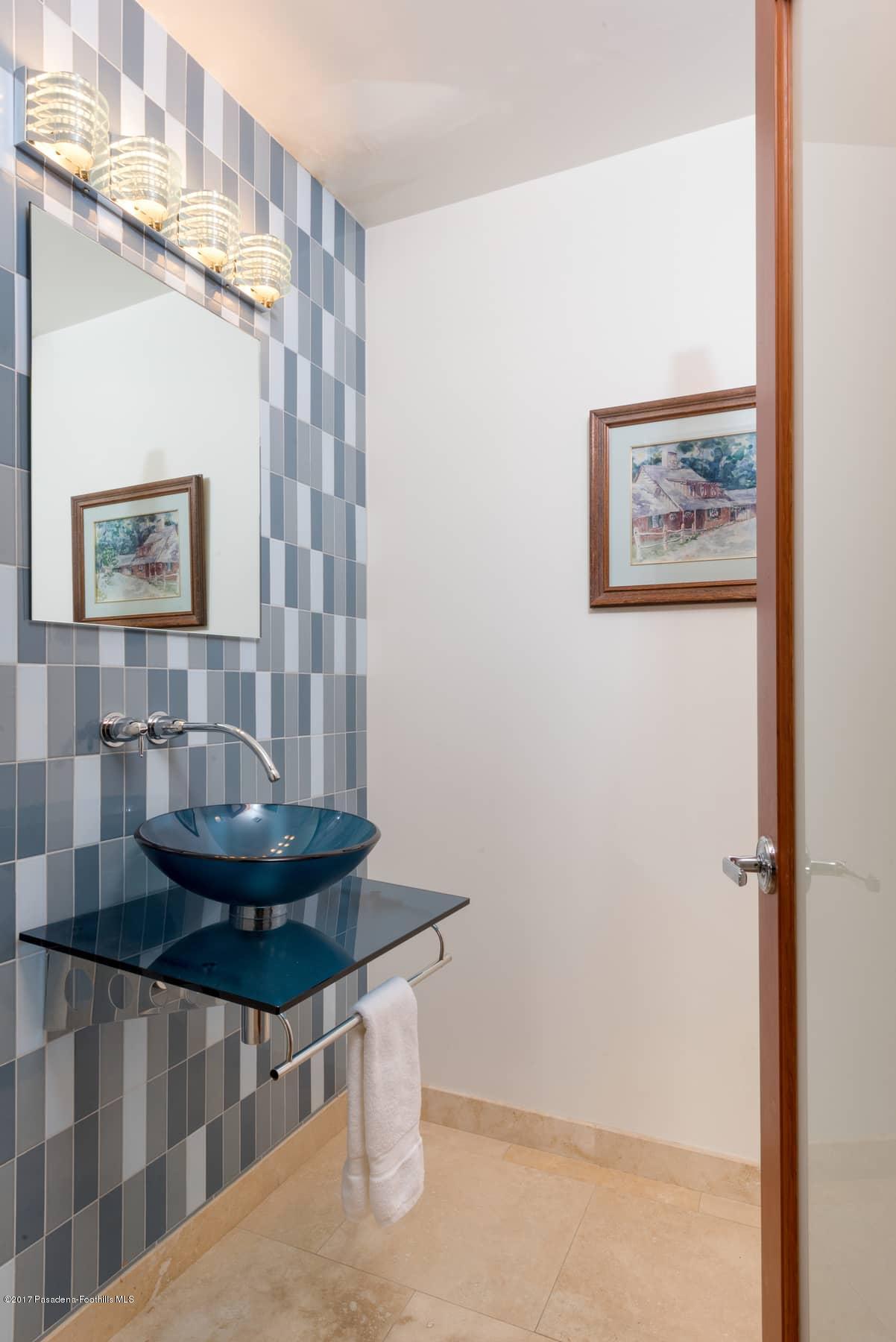 3430 Ellington Villa Drive Altadena, CA 91001 - Photo 18 of 49 a bathroom with a sink and a mirror