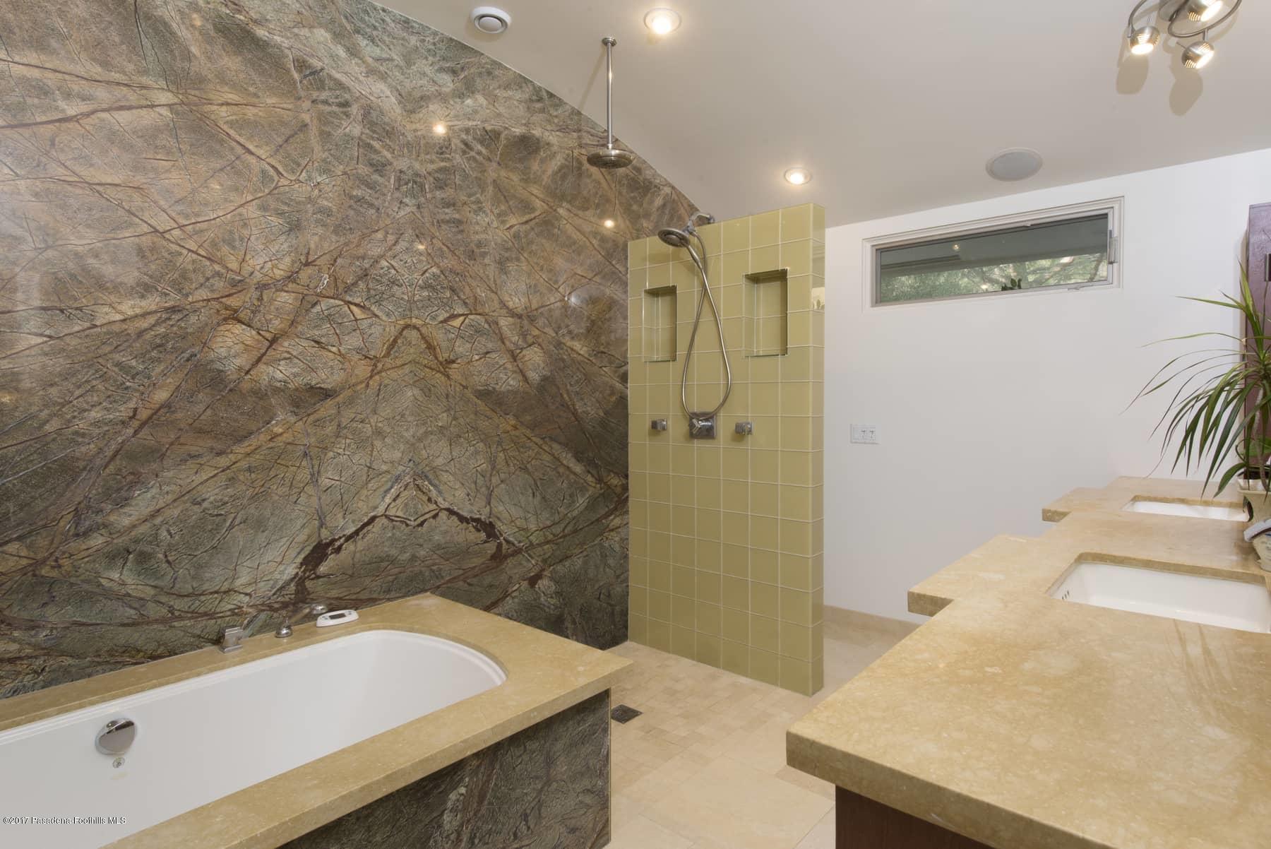 3430 Ellington Villa Drive Altadena, CA 91001 - Photo 22 of 49 a bathroom with a sink and a bathtub