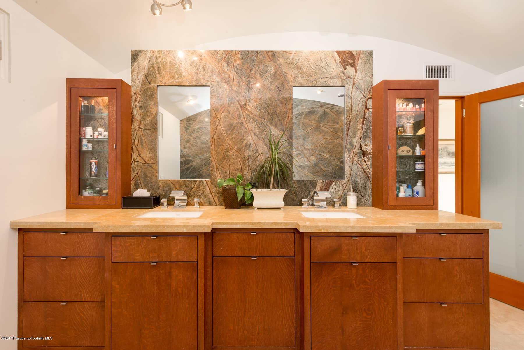 3430 Ellington Villa Drive Altadena, CA 91001 - Photo 24 of 49 a bathroom with a sink and a mirror