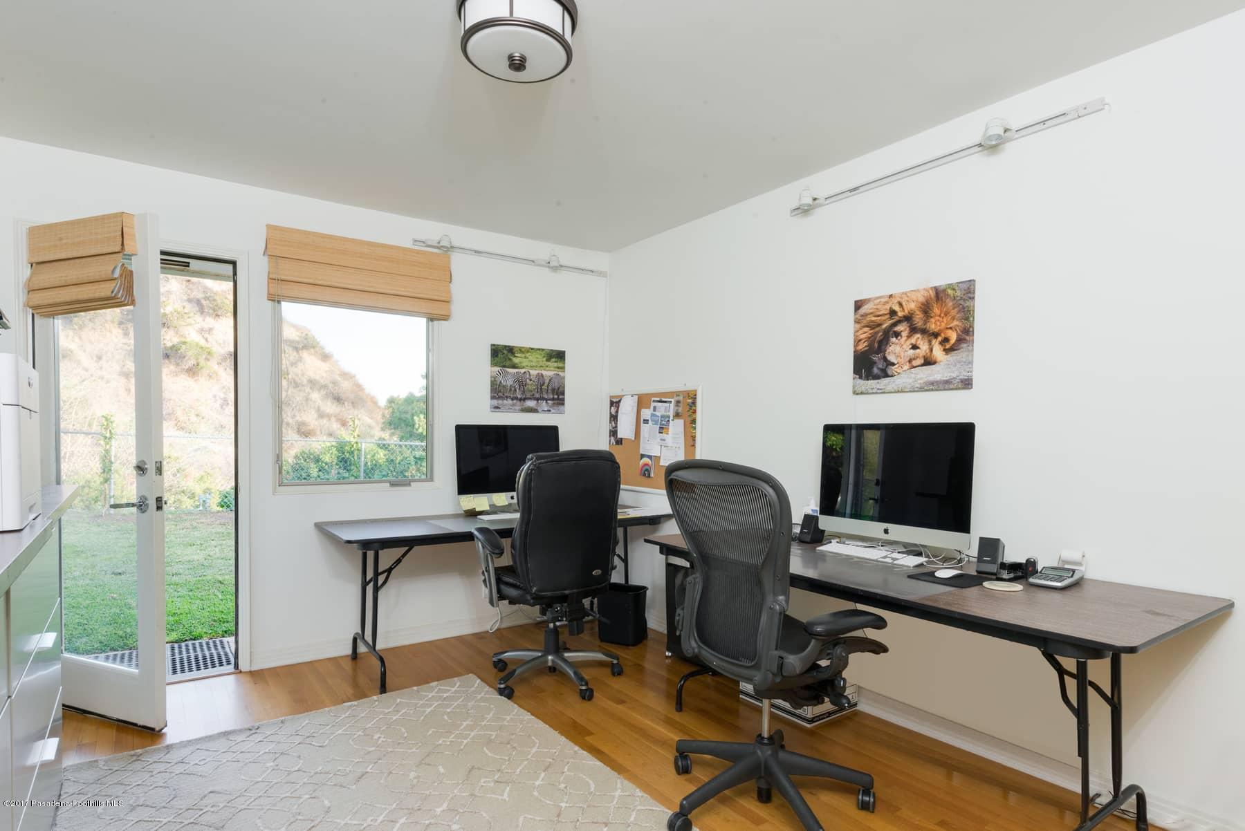 3430 Ellington Villa Drive Altadena, CA 91001 - Photo 27 of 49 a view of a workspace with furniture and a window