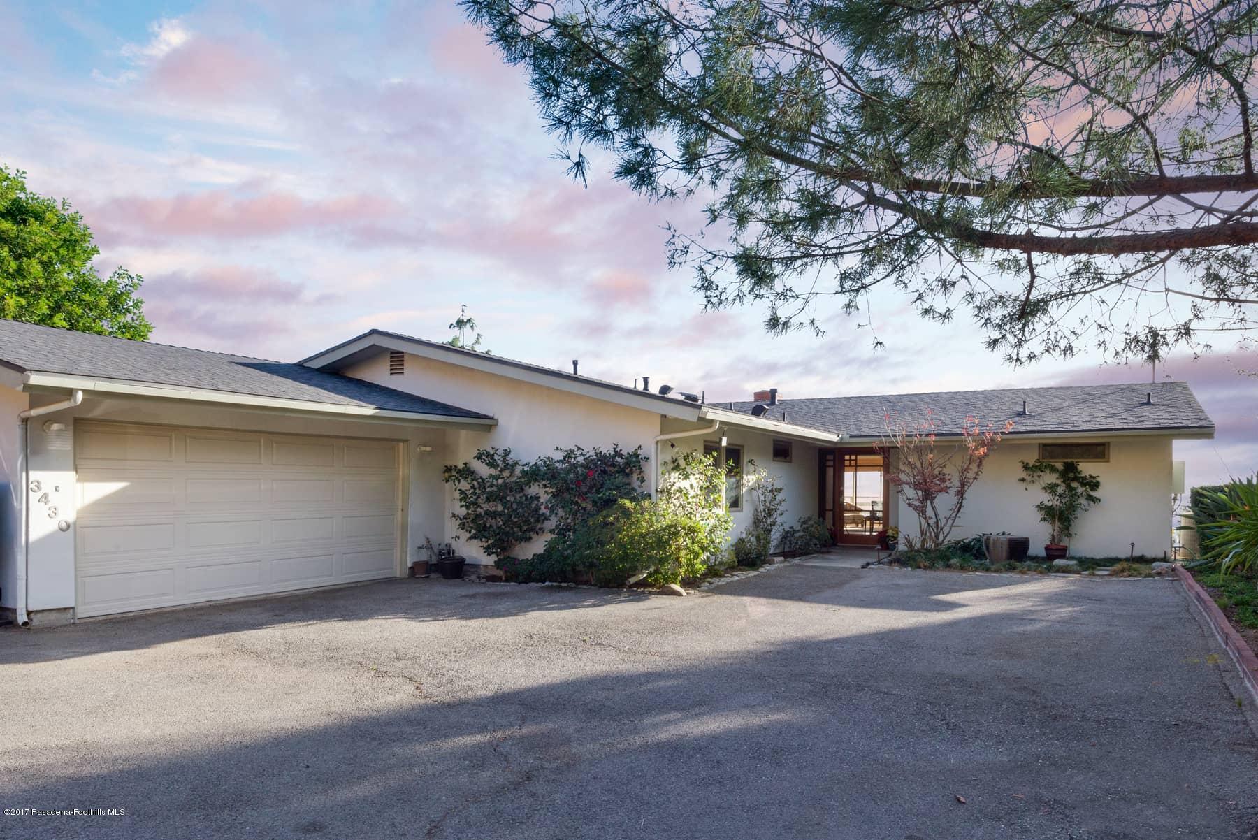 3430 Ellington Villa Drive Altadena, CA 91001 - Photo 3 of 49 a view of a house with a yard and potted plants