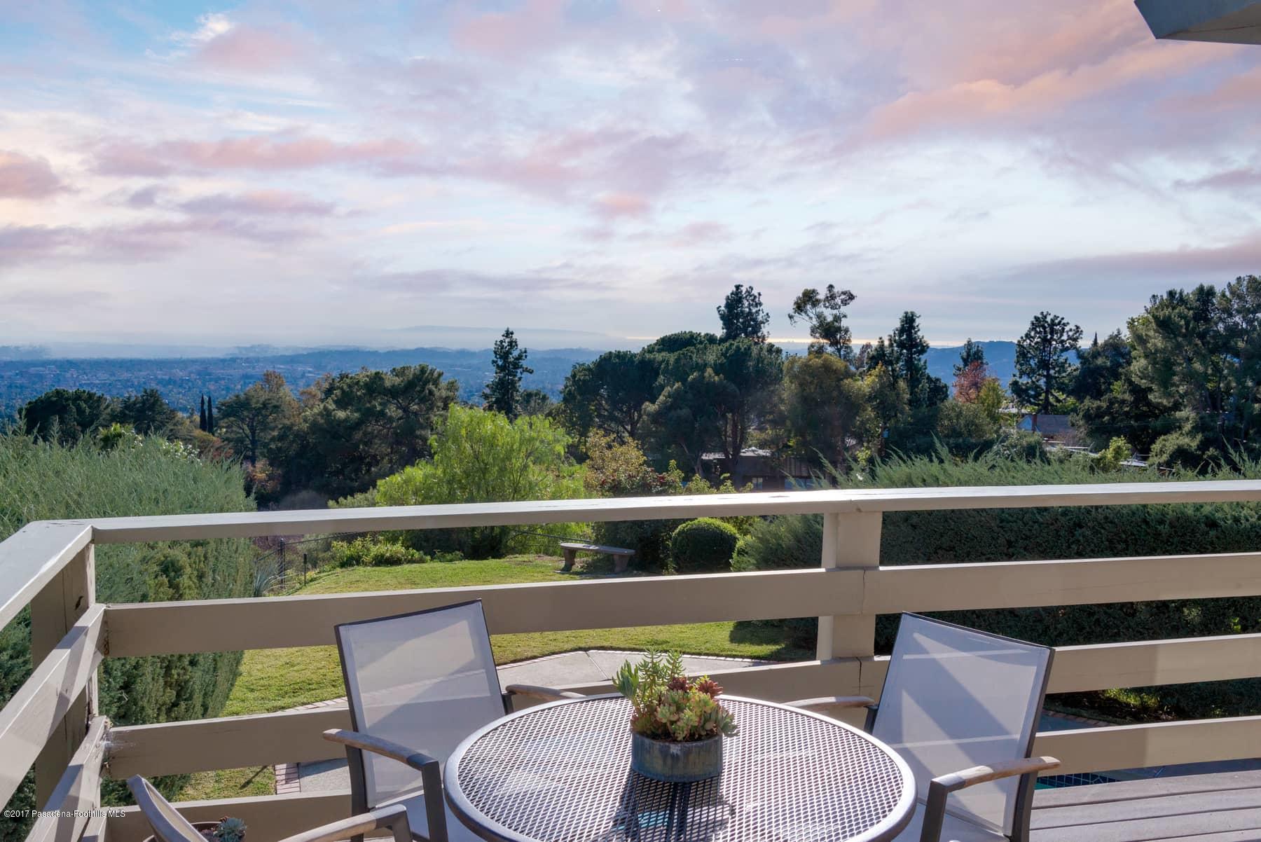 3430 Ellington Villa Drive Altadena, CA 91001 - Photo 34 of 49 a view of a chair and tables in the backyard