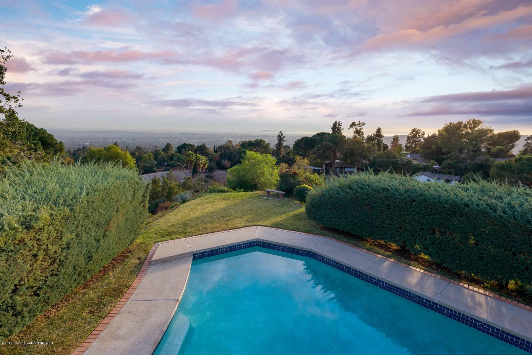 3430 Ellington Villa Drive Altadena, CA 91001 - Photo 39 of 49 a view of a swimming pool with a yard